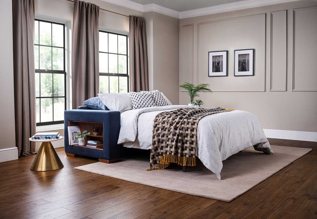 blue colored sofa bed with open storage on the side